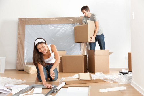 Professional movers handling boxes in Edmonton