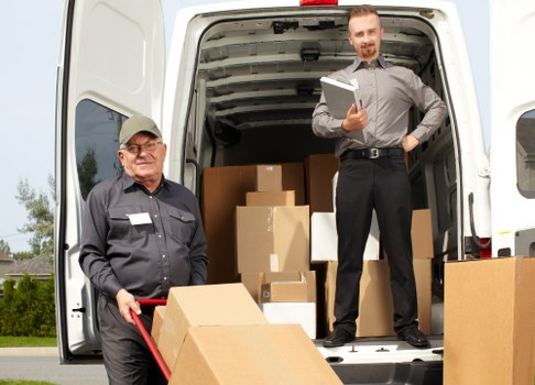 Professional movers handling furniture in Highgate