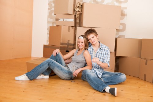 Professional movers handling household items in Clapham